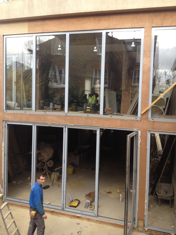 Aluminium bi-fold doors with two-storey glazing in Pimlico